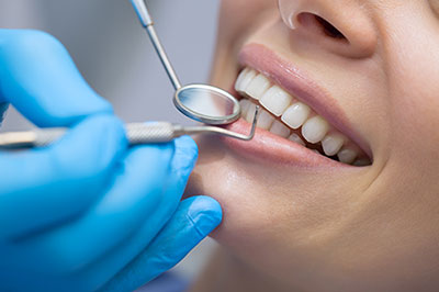 Identical Dental | Dental Bridges, Extractions and Oral Cancer Screening